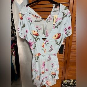 Blue multi colored open back short sleeves romper